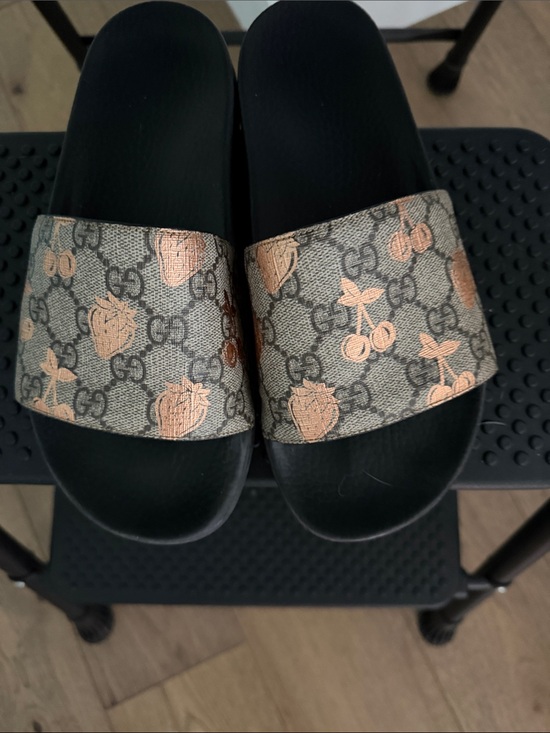 Gucci Shoes - Gucci Beige GG Canvas Slides with Metallic Copper Fruit Motif